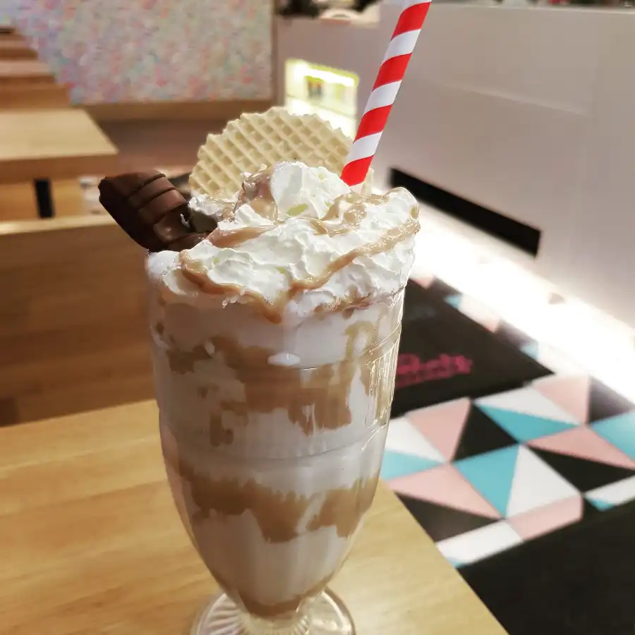 Bueno shake topped with bueno, wafer and straw in it